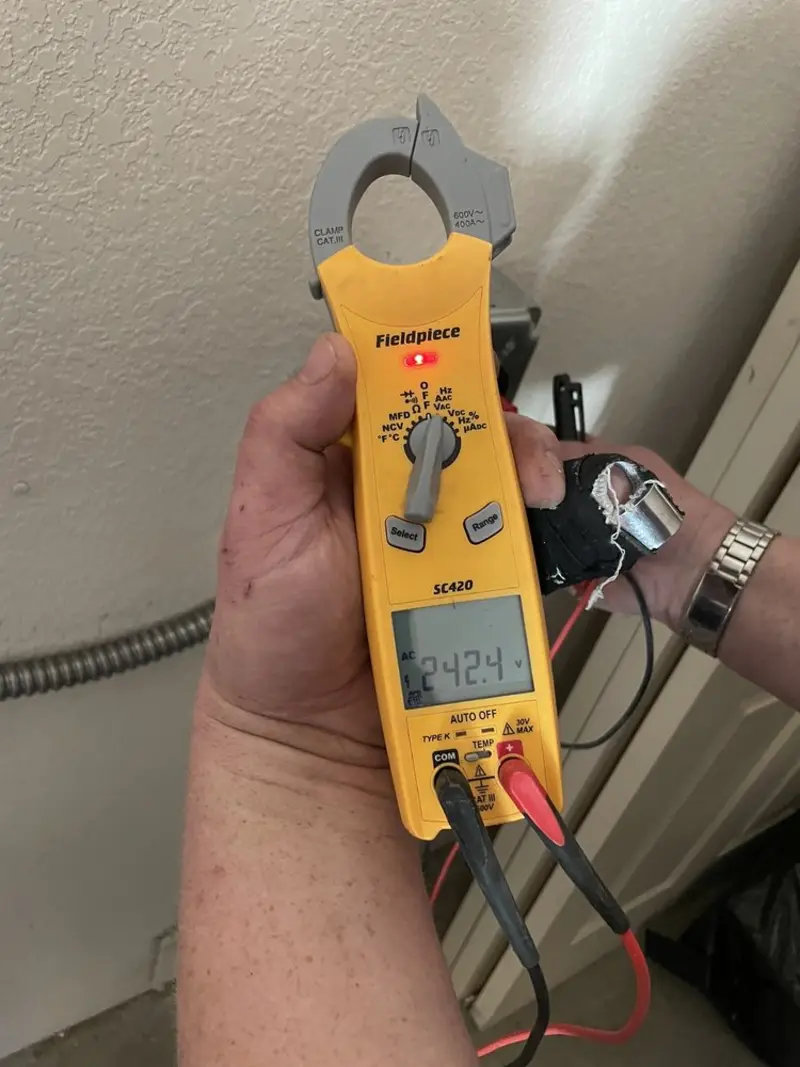 Voltage testing with clamp meter during Generator Installation in Shelbyville
